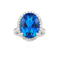 Oval Blue Topaz Halo Ring